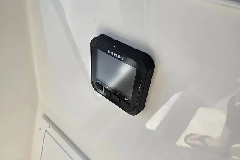 Slide: The Image of Suzuki display on 2026 Sea Pro 242 Center Console Sport boat dashboard. - 31
