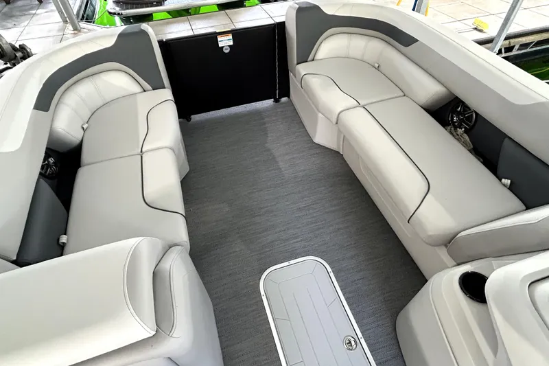 Slide: The Image of 2026 Godfrey Sweetwater 2486 SFLC boat interior with spacious seating and modern design. - 16