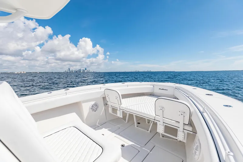 Slide: The Image of 2020 SeaHunter 33 Tournament boat with ocean view and city skyline in the distance. - 7