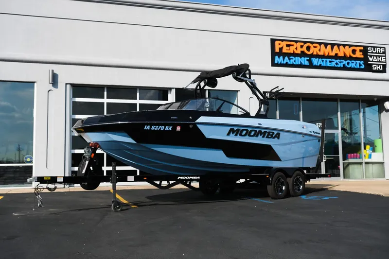 The Image of 2024 Moomba Tykon boat on trailer at Performance Marine Watersports dealership. - 1