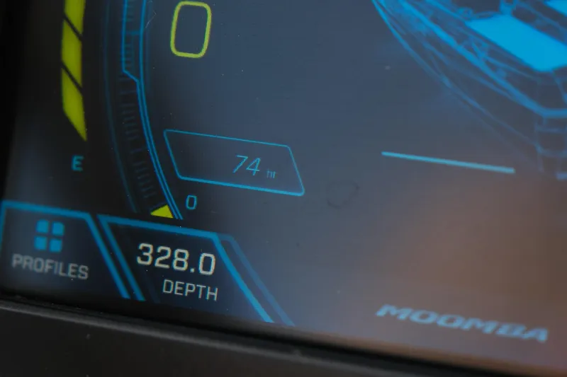 Slide: The Image of Close-up of 2024 Moomba Tykon dashboard display showing depth and profiles. - 20