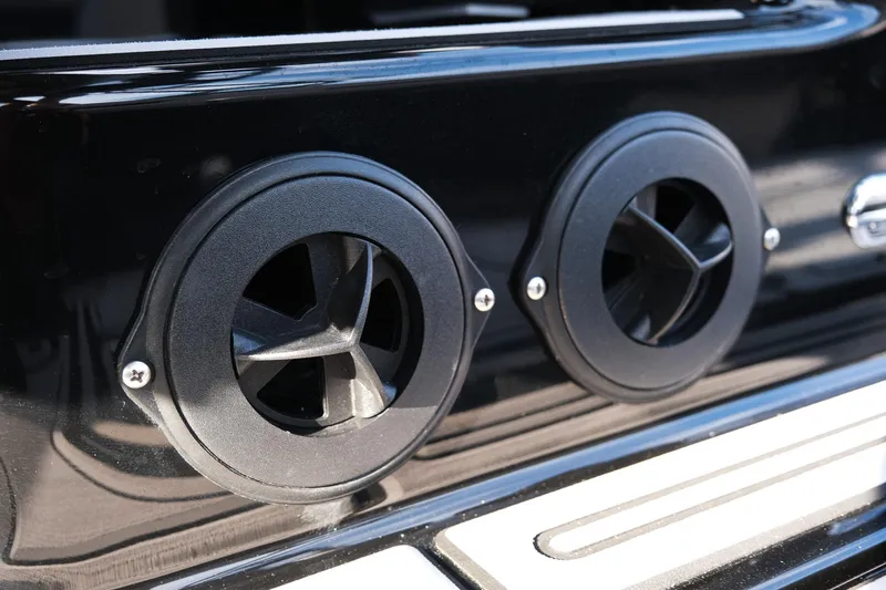 Slide: The Image of 2024 Moomba Tykon boat exhaust vents, close-up view. - 27