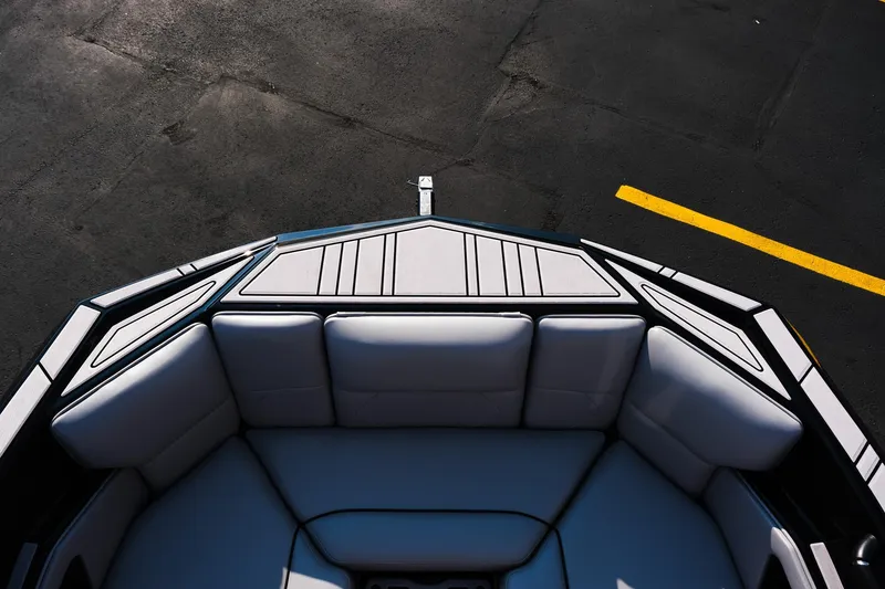 Slide: The Image of 2024 Moomba Tykon boat interior with sleek seating design, viewed from above. - 28