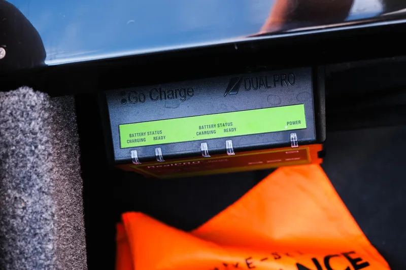 Slide: The Image of 2024 Moomba Tykon battery charger with status indicators and orange safety equipment. - 29