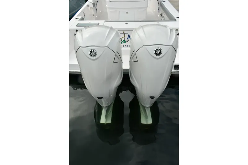 Slide: The Image of Twin outboard engines on a 2022 Everglades 335 Center Console boat. - 17