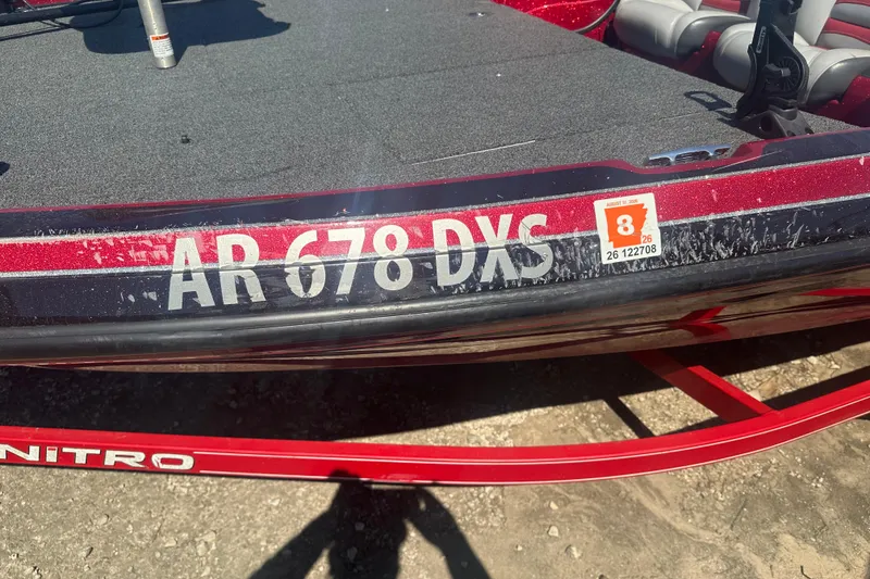 Slide: The Image of 2011 Nitro Z-6 boat with registration AR 678 DXS and August 2026 sticker. - 2