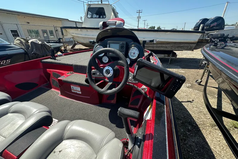 Slide: The Image of 2011 Nitro Z-6 boat interior with steering wheel and navigation system. - 7