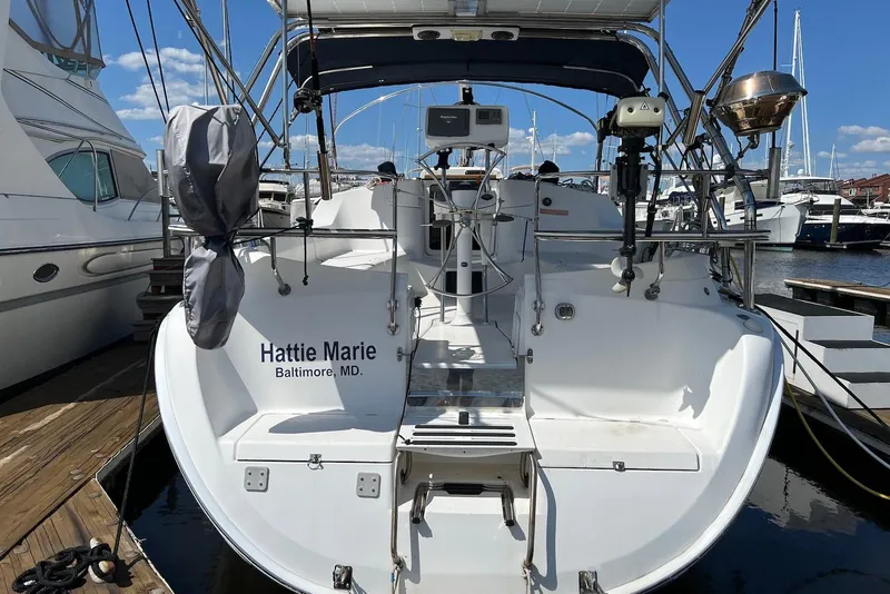 Slide: The Image of 2005 Hunter 44 Deck Salon sailboat docked, rear view, named "Hattie Marie," Baltimore, MD. - 3