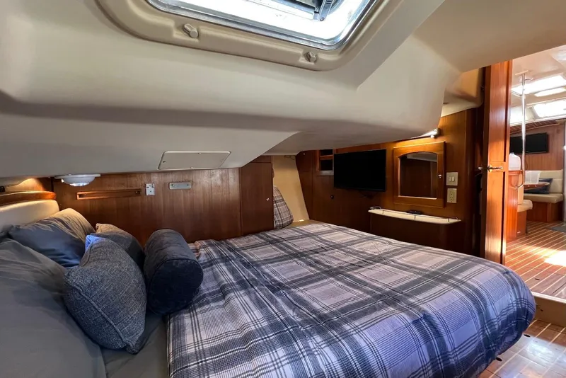 Slide: The Image of Luxurious interior of 2005 Hunter 44 Deck Salon yacht with cozy bedroom and modern amenities. - 37