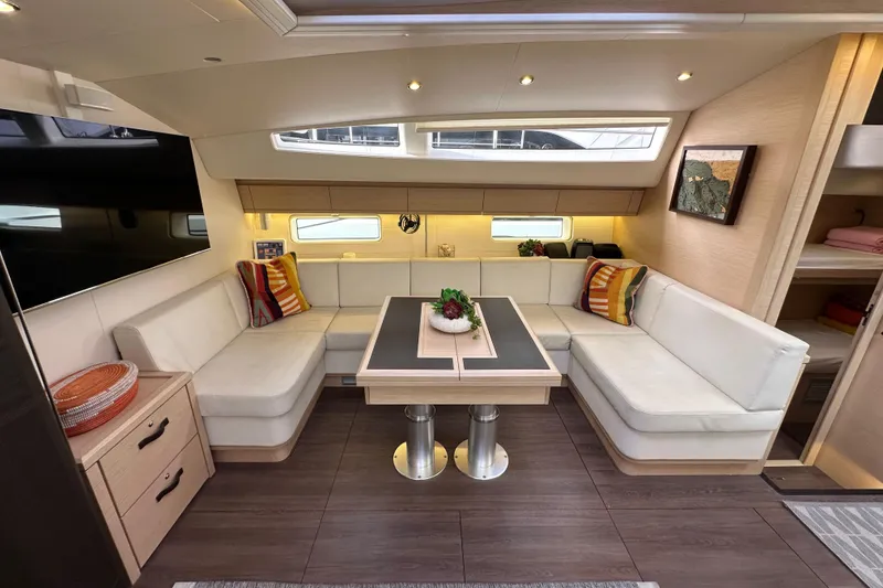 Slide: The Image of Luxurious interior of 2017 Jeanneau 64 yacht with elegant seating and modern decor. - 108