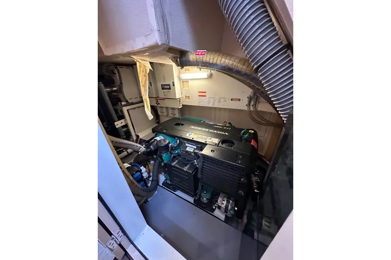 Slide: The Image of Engine room of a 2017 Jeanneau 64 yacht, featuring a Volvo Penta engine. - 133