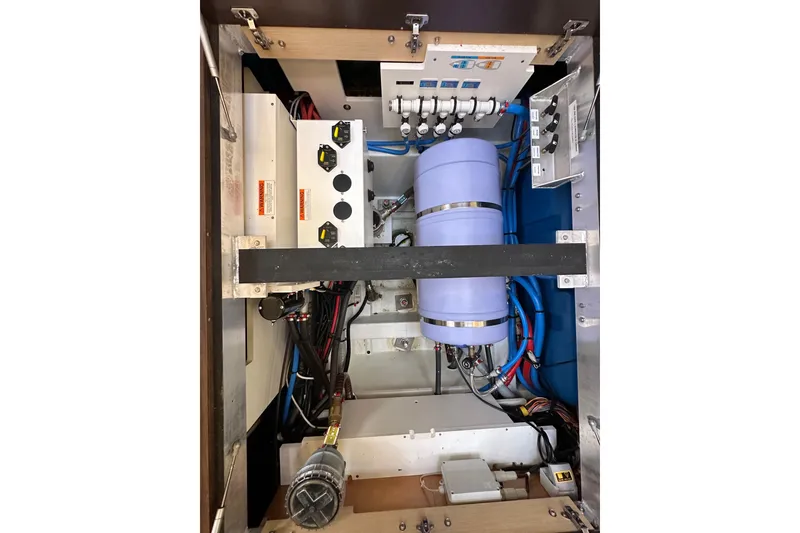 Slide: The Image of Electrical system of a 2017 Jeanneau 64 yacht, featuring wiring and components. - 143