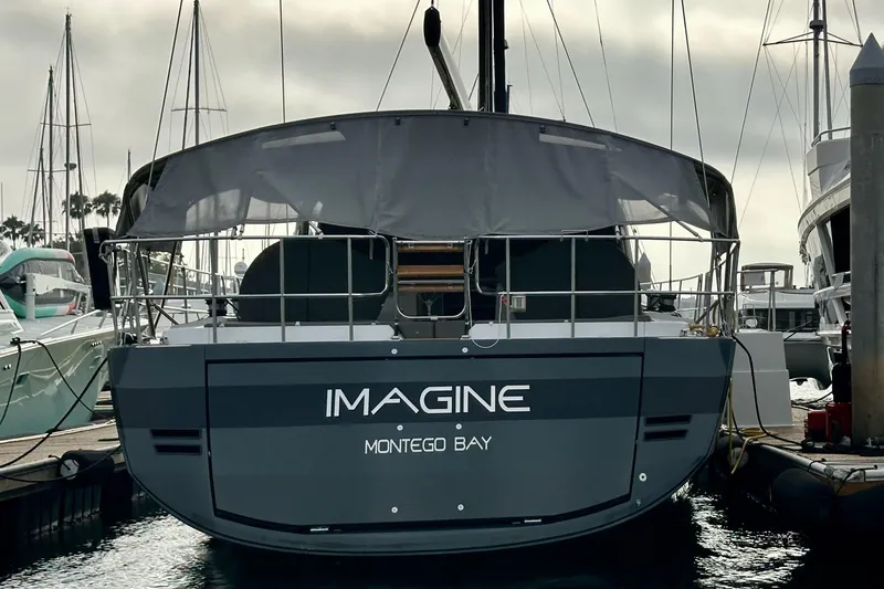 Slide: The Image of 2017 Jeanneau 64 yacht "Imagine" docked at Montego Bay marina. - 145