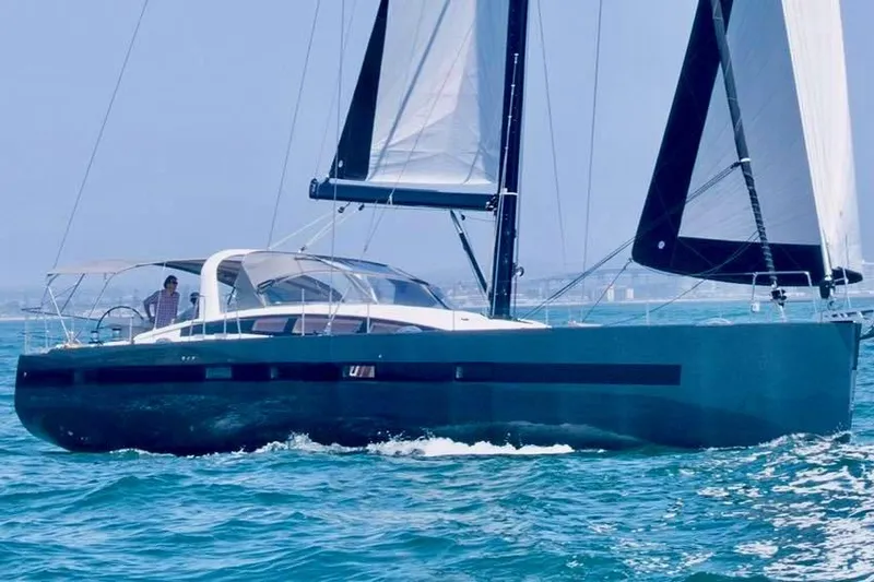 Slide: The Image of 2017 Jeanneau 64 sailing yacht cruising on open water. - 146