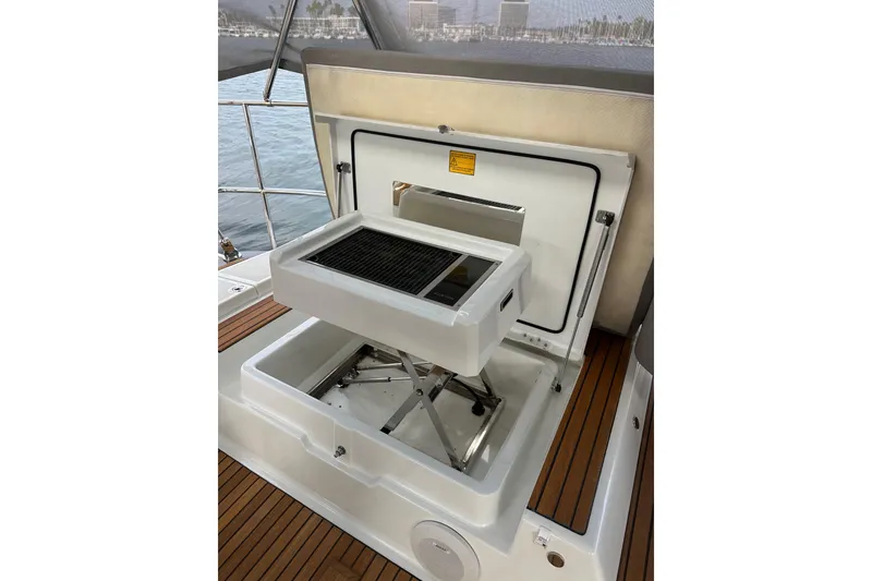 Slide: The Image of Built-in grill on 2017 Jeanneau 64 yacht deck, featuring sleek design and functionality. - 39