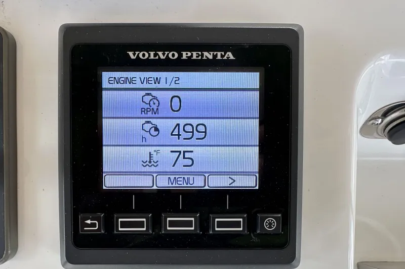 Slide: The Image of Volvo Penta engine display on 2017 Jeanneau 64, showing RPM, hours, and temperature. - 56