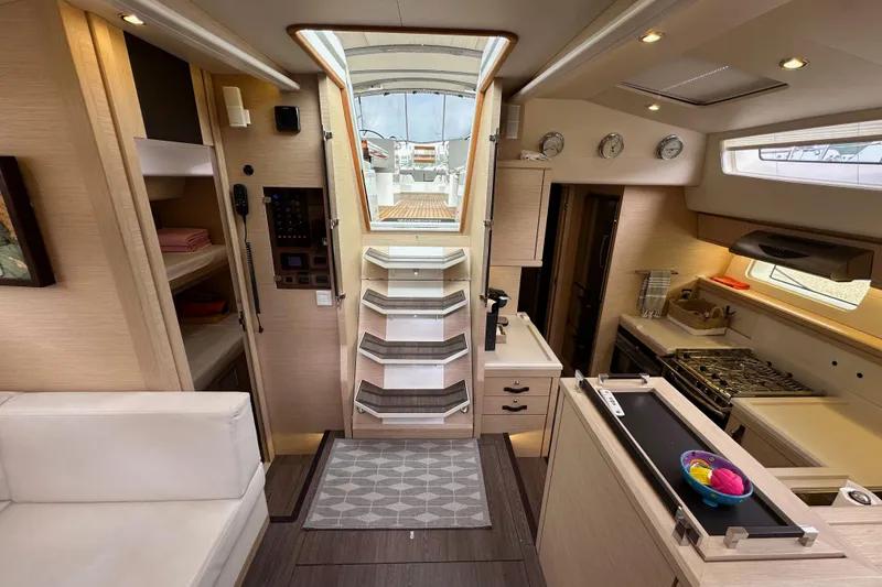 Slide: The Image of Luxurious interior of 2017 Jeanneau 64 yacht with modern kitchen and elegant design. - 73