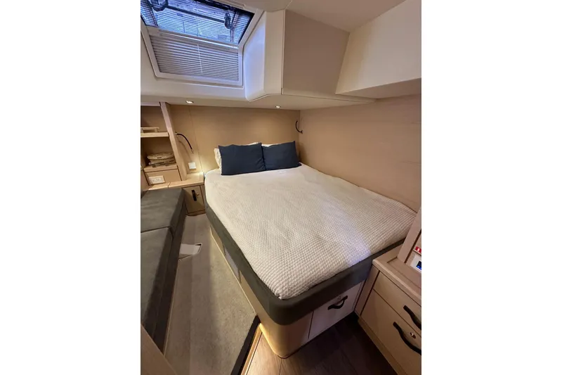 Slide: The Image of Luxurious cabin interior of 2017 Jeanneau 64 yacht with cozy bed and modern design. - 81