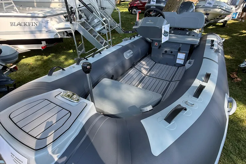 Slide: The Image of 2025 Highfield Classic 380 inflatable boat with sleek design and modern features. - 4
