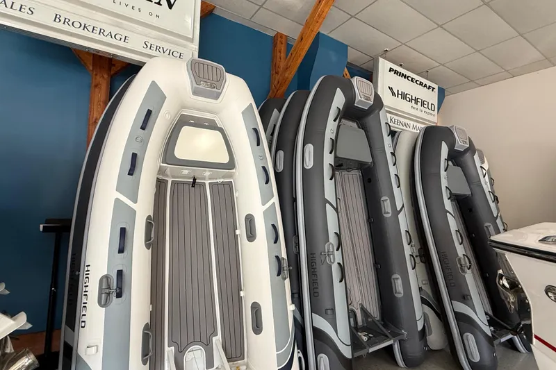 Slide: The Image of 2025 Highfield Classic 380 inflatable boats displayed in a showroom. - 6