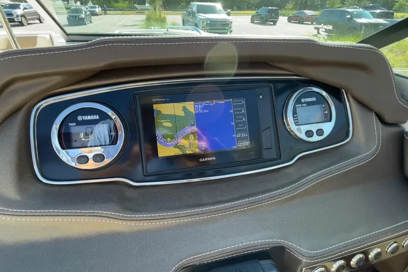 Slide: The Image of Dashboard of 2019 Chaparral 210 Suncoast boat with Garmin GPS and Yamaha gauges. - 17