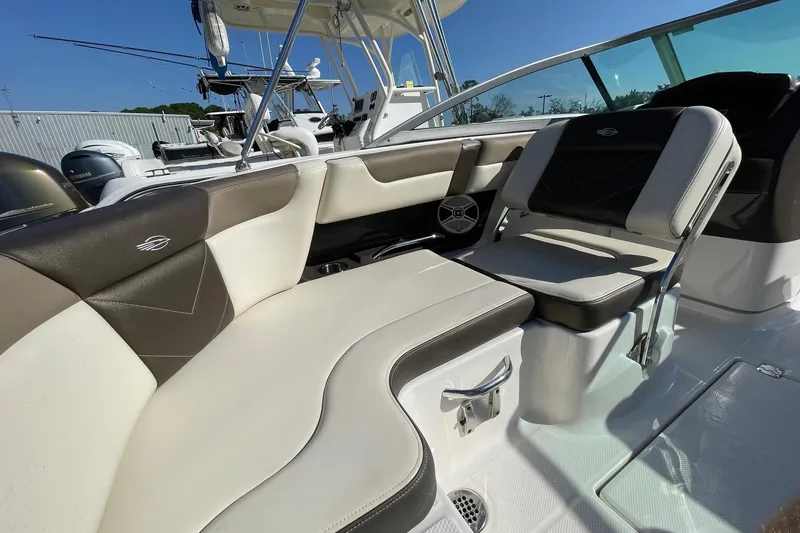 Slide: The Image of 2019 Chaparral 210 Suncoast boat interior with stylish seating and modern design. - 20