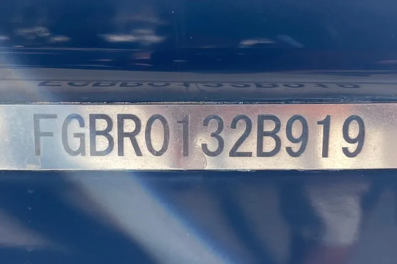 Slide: The Image of 2019 Chaparral 210 Suncoast boat hull identification number (HIN) plate. - 44