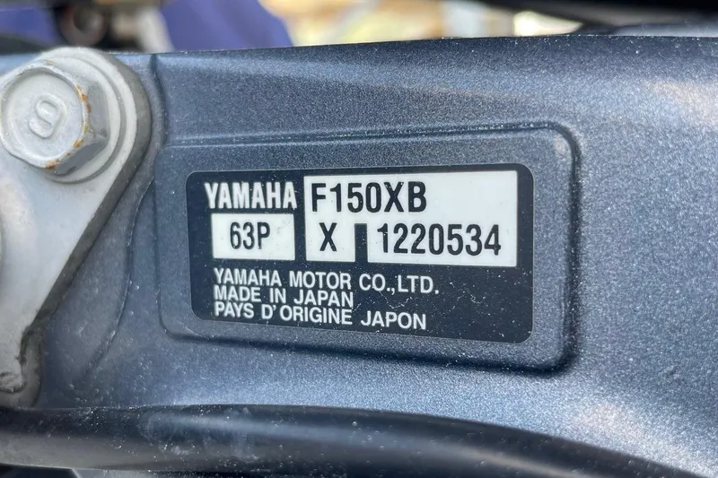 Slide: The Image of Yamaha F150XB engine label on 2019 Chaparral 210 Suncoast, made in Japan. - 47