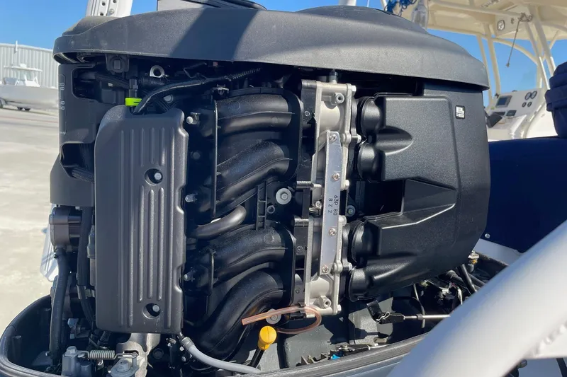 Slide: The Image of 2019 Chaparral 210 Suncoast boat engine, detailed view of components and structure. - 48