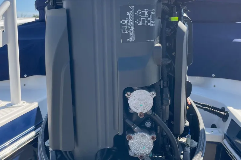 Slide: The Image of 2019 Chaparral 210 Suncoast boat engine close-up, showcasing mechanical details. - 50