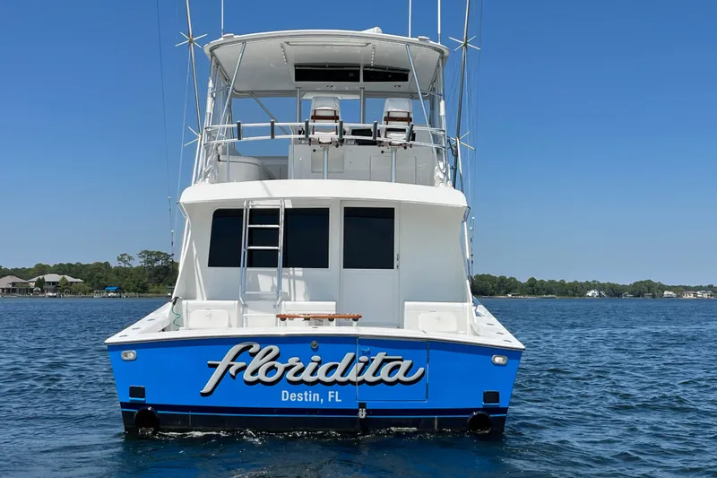 Slide: The Image of 1997 Post Sportfish boat named Floridita in Destin, FL, on calm water. - 8