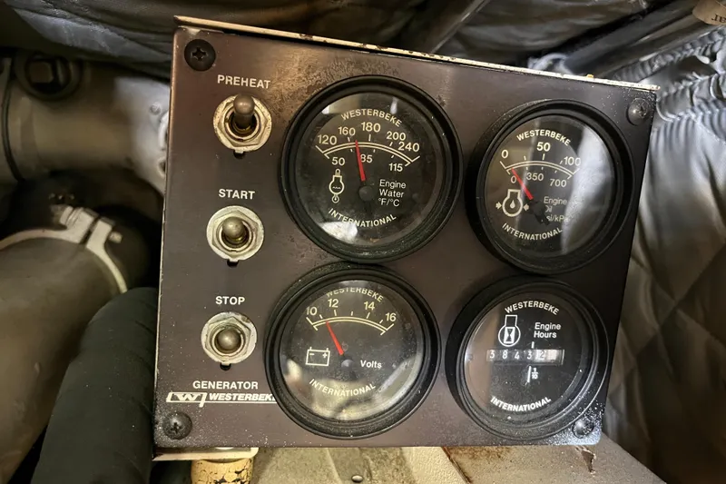 Slide: The Image of Control panel of a 1997 Post Sportfish boat with Westerbeke generator gauges. - 20