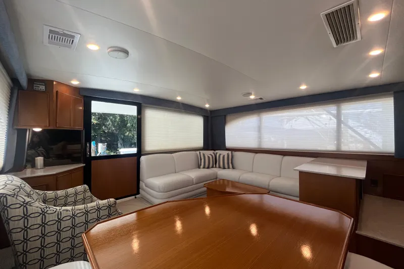 Slide: The Image of Luxurious interior of a 1997 Post Sportfish yacht with elegant seating and modern design. - 25