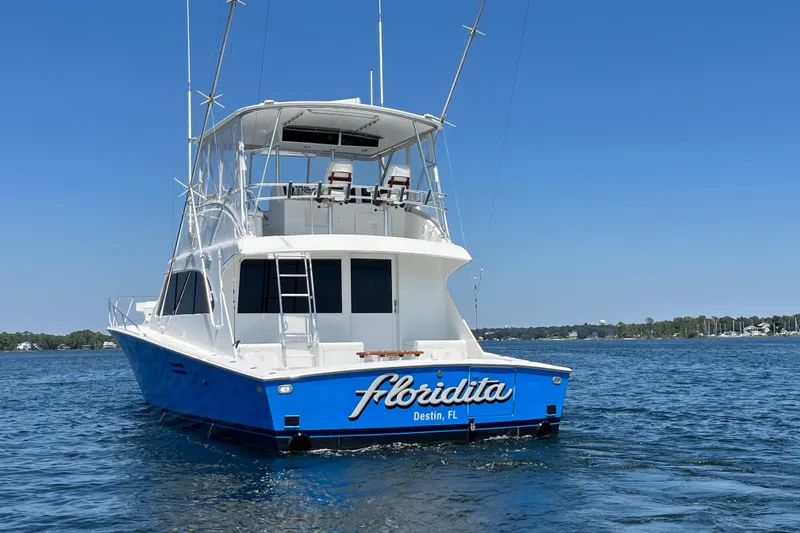 Slide: The Image of 1997 Post Sportfish boat named Floridita on the water in Destin, FL. - 5