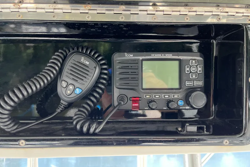 Slide: The Image of VHF marine radio in a 1997 Post Sportfish boat cockpit. - 62