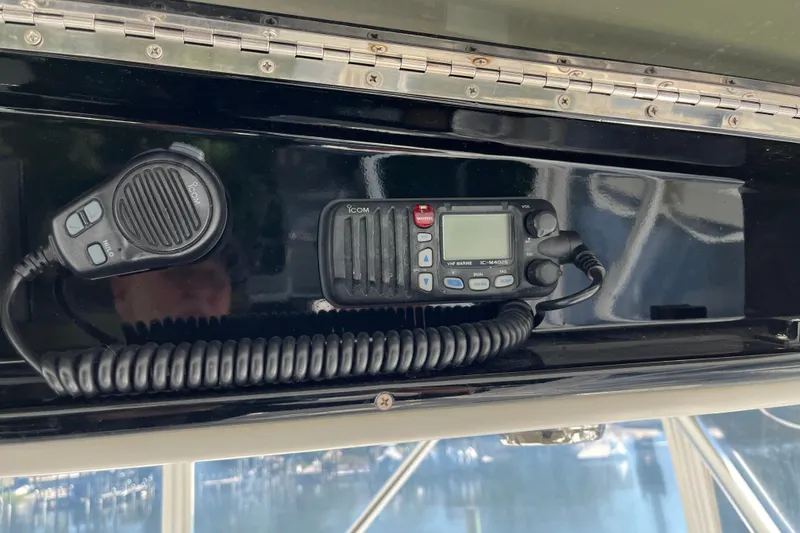 Slide: The Image of VHF marine radio on 1997 Post Sportfish boat dashboard. - 63