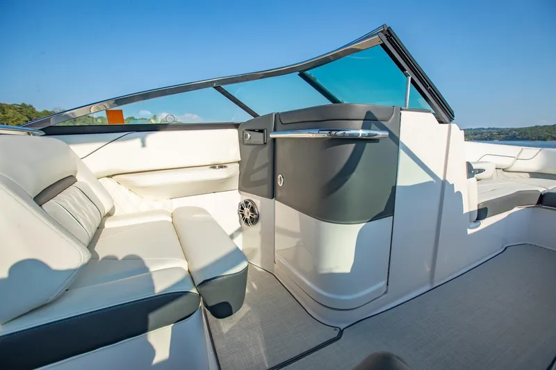 Slide: The Image of Luxurious interior of 2020 Regal LS6 boat with plush seating and sleek design. - 14