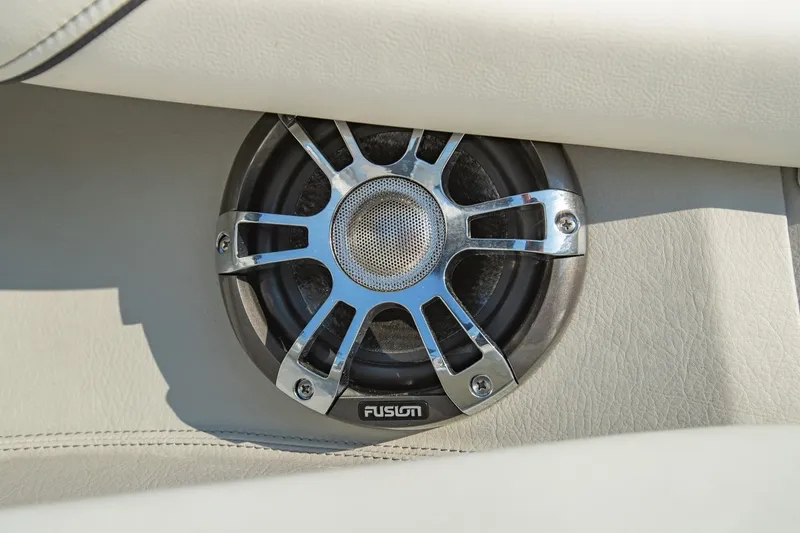 Slide: The Image of Fusion speaker in 2020 Regal LS6 boat, mounted on white leather interior. - 28