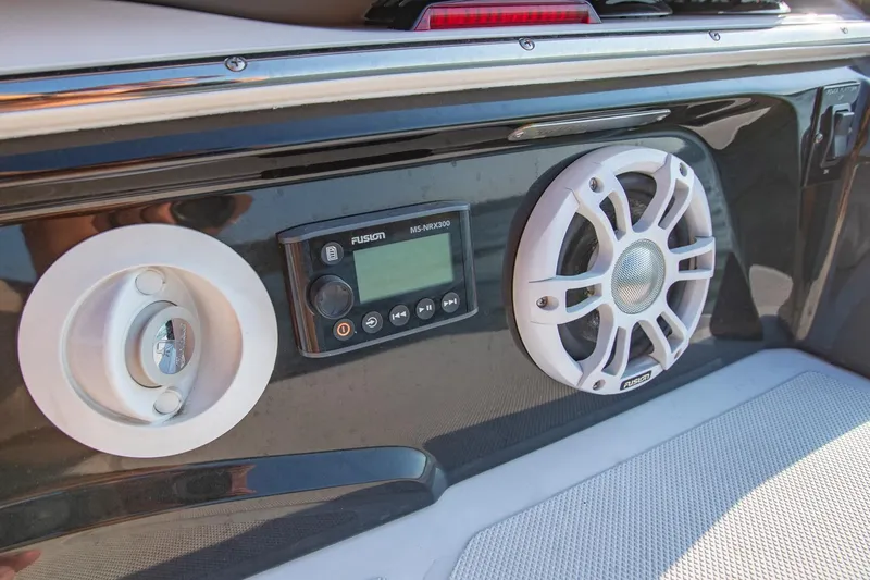 Slide: The Image of 2020 Regal LS6 boat audio system with Fusion speakers and control panel. - 31