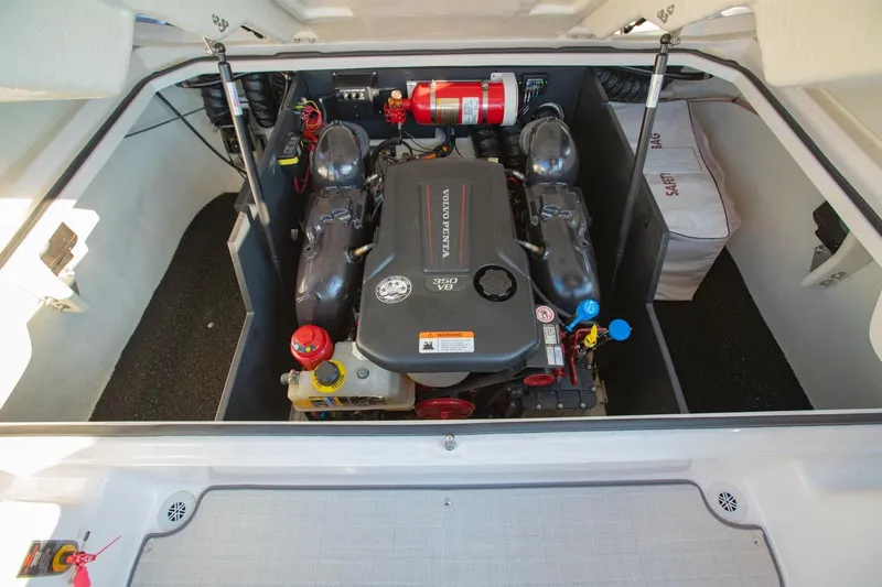 Slide: The Image of Engine compartment of 2020 Regal LS6 boat with Volvo Penta engine and safety equipment. - 33