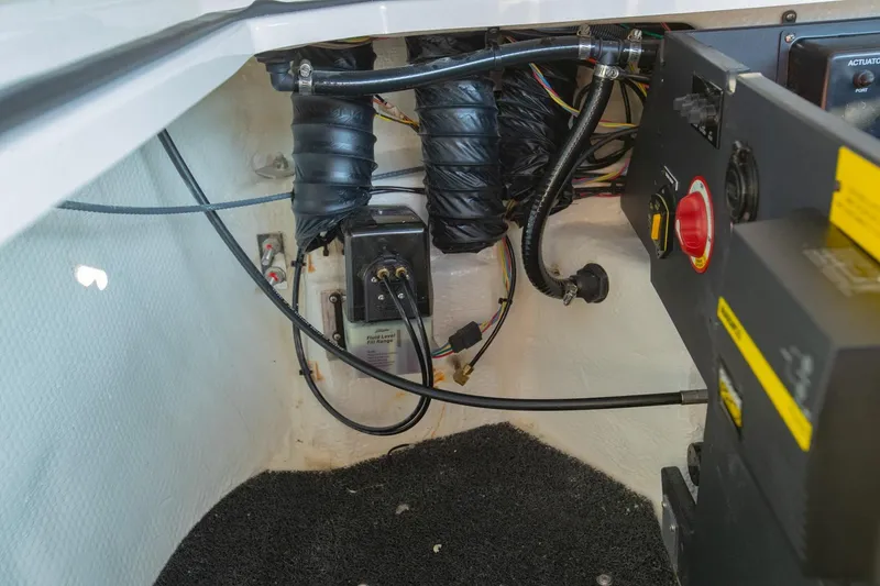 Slide: The Image of 2020 Regal LS6 boat interior wiring and components, showcasing electrical connections and control systems. - 35