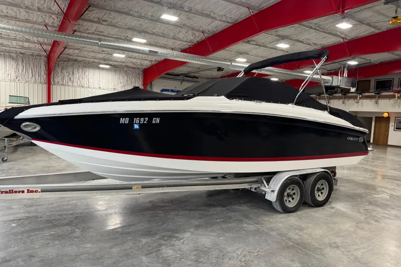 Slide: The Image of 2008 Cobalt 232 boat on trailer in indoor storage facility. - 5