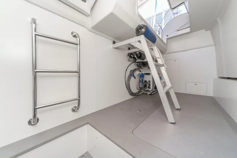 Slide: The Image of 2017 Monte Carlo MC5S yacht interior with ladder and equipment. - 61