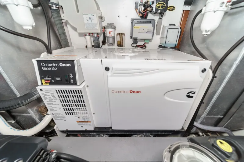 Slide: The Image of Cummins Onan generator in 2017 Monte Carlo MC5S engine room, showcasing advanced marine technology. - 70