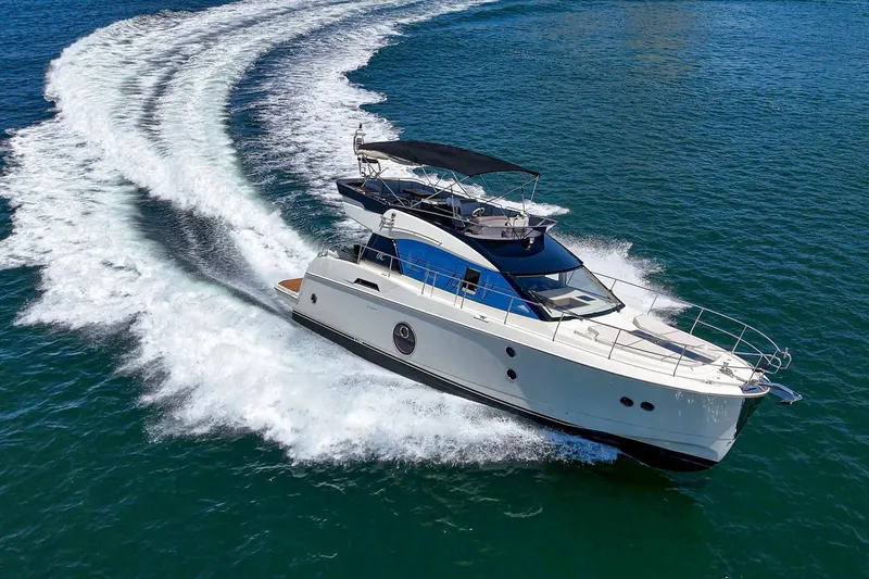 Slide: The Image of Luxury Monte Carlo MC5S yacht cruising on open water, 2017 model. - 16