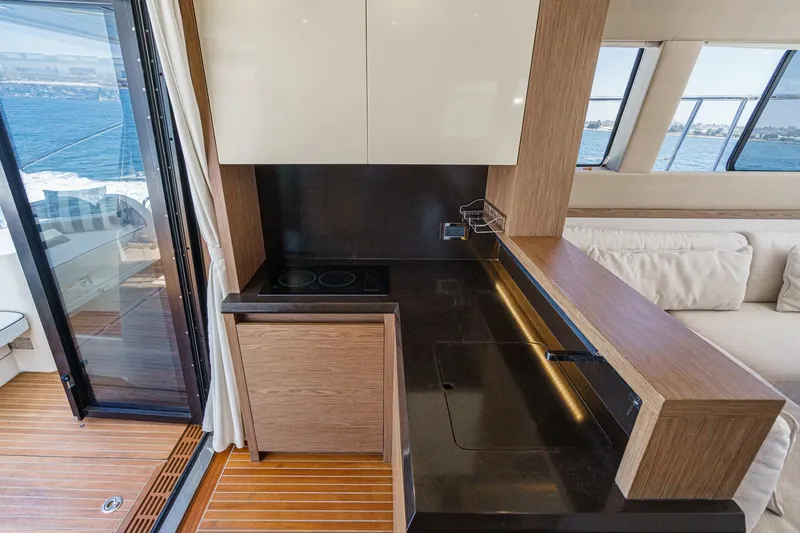 Slide: The Image of Luxurious 2017 Monte Carlo MC5S yacht interior with modern kitchen and ocean view. - 35