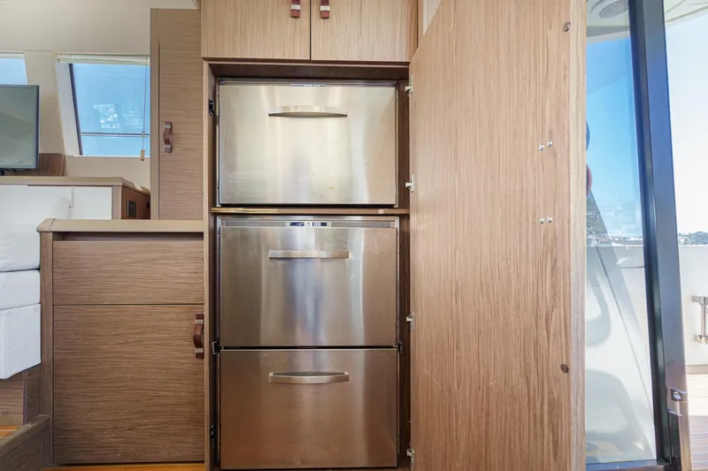 Slide: The Image of Modern kitchen area in 2017 Monte Carlo MC5S yacht with stainless steel appliances. - 36