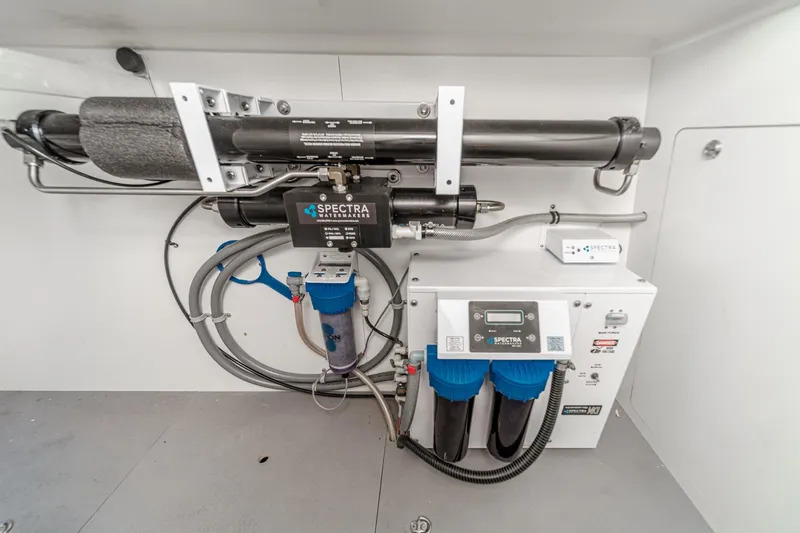 Slide: The Image of Spectra watermaker system in 2017 Monte Carlo MC5S yacht, featuring advanced filtration technology. - 63