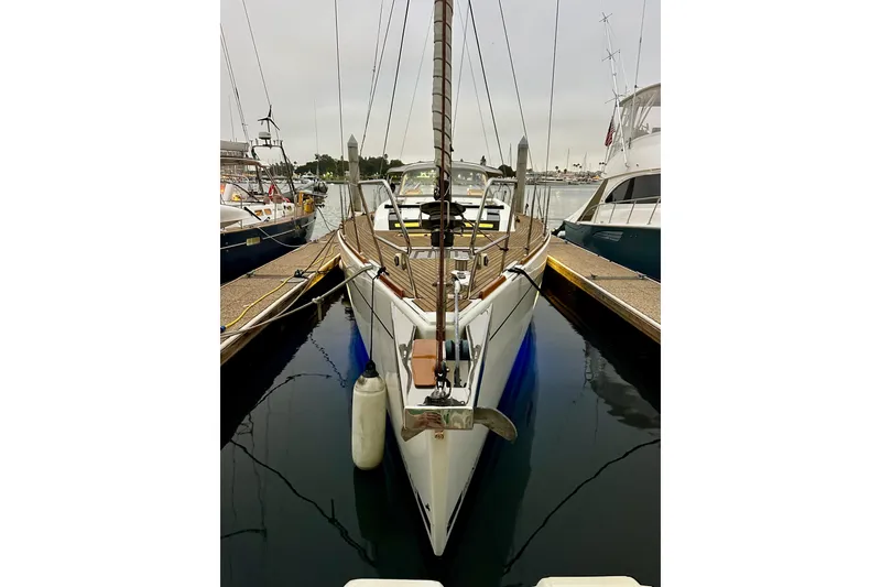 Slide: The Image of 2021 Beneteau Oceanis 55.1 yacht docked at marina, front view. - 2