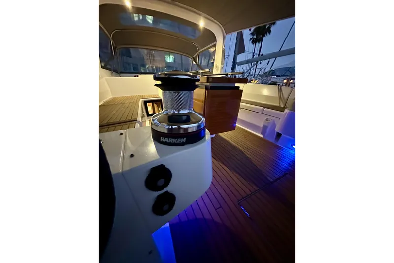 Slide: The Image of Interior of 2021 Beneteau Oceanis 55.1 yacht with Harken winch and ambient lighting. - 26